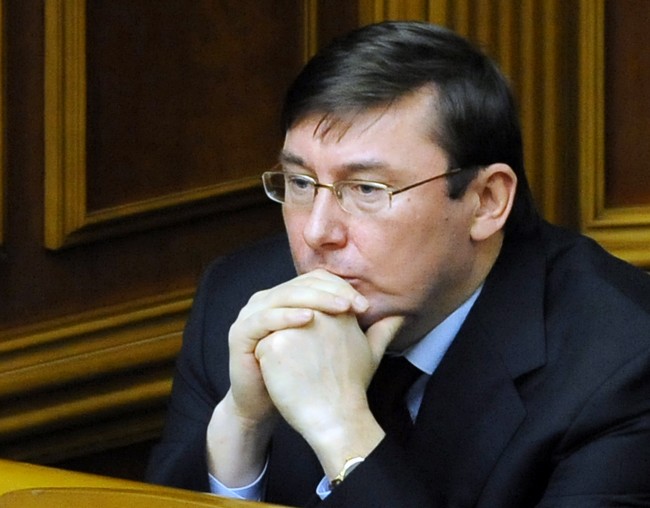 Ukraine's Interior Minister Yuriy Lutsenko listens to deputies during an extraordinary hearing of the Parliament in Kiev on January 28, 2010. The parliament on Thursday sacked , adding to tensions just over one week before the final round of presidential polls. Ukraine's parliament sacked Interior Minister Yuriy Lutsenko, adding to tensions just over one week before the final round of presidential polls. The Verkhovna Rada adopted a bill relieving Lutsenko of his duties, the lower house of parliament said in a statement on its website. According to the Interfax-Ukraine news agency, 231 deputies voted for his removal. AFP PHOTO/ VOLODYMYR STRUMKOVSKY (Photo credit should read VOLODYMYR STRUMKOVSKY/AFP/Getty Images)