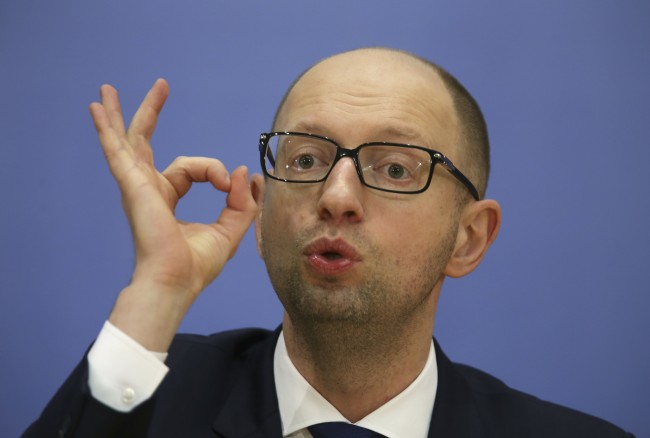 Ukrainian Prime Minister Arseny Yatseniuk attends a news conference in Kiev December 30, 2014. REUTERS/Konstantin Grishin (UKRAINE - Tags: POLITICS HEADSHOT) - RTR4JNAO