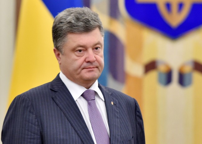 Ukrainian President Petro Poroshenko arrives for a National Security and Defence Council sitting in Kiev on June 16, 2014. Poroshenko said during the opening of the sitting that a ceasefire was the beginning of his peace plan for resolving the conflict in eastern Ukraine.  AFP PHOTO/ SERGEI SUPINSKY        (Photo credit should read SERGEI SUPINSKY/AFP/Getty Images)