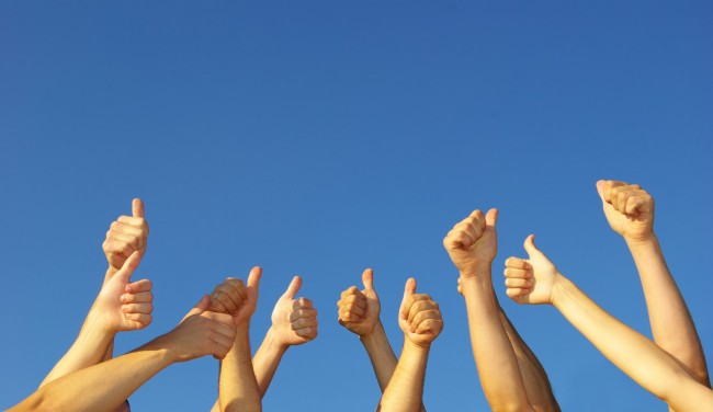Group of people hands in the air