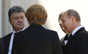 Putin, Poroshenko and Merkel talk in Benouville